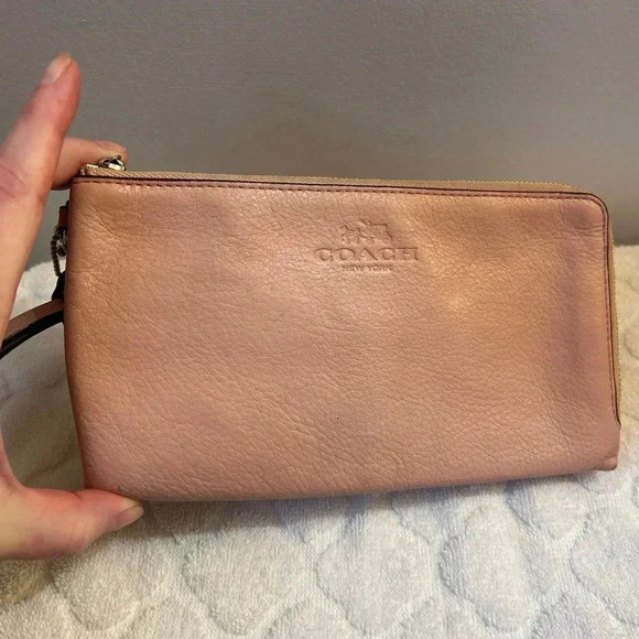 Coach Handbags - Authentic Coach wristlet wallet pale pink. Leather.